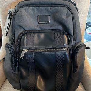 TUMI brand backpack. Gently used. Grey and Black